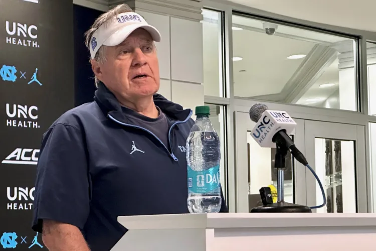 Belichick says son, Heels’ DC, is on medical leave